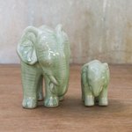 Celadon ceramic statuettes, 'Natural Nurture' (pair) - Green Celadon Ceramic Elephant Statuettes (Pair)