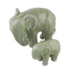 Celadon ceramic statuettes, 'Natural Nurture' (pair) - Green Celadon Ceramic Elephant Statuettes (Pair)