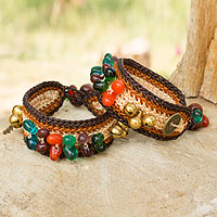 Beaded wristband bracelets, 'Bold Fortunes' (pair) - Beaded Wristband Bracelets (Pair)