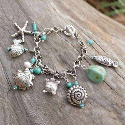 Cultured pearl charm bracelet, 'Open Sea' - 950 Silver and Cultured Pearl Charm Bracelet