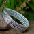 Sterling silver wristband bracelet, 'Woven Hideaway' - Handcrafted Floral Sterling Silver Wristband Bracelet thumbail