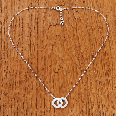 Sterling silver two circle pendant necklace, 'Infinity Love' - Sterling Silver Two Circle Pendant Necklace