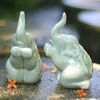 Celadon ceramic figurines, 'Elephant Prayer' (pair) - Green Celadon Ceramic Sculptures (Pair)