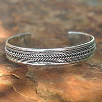 Sterling silver cuff bracelet, 'Lanna Illusions' - Sterling Silver Cuff Bracelet