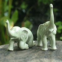 Celadon ceramic statuette, 'Welcoming Elephants' (pair)
