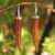 Holz-Baumelohrringe, 'Alles über das Glück' - Handgefertigte Ohrringe aus Mangoholz