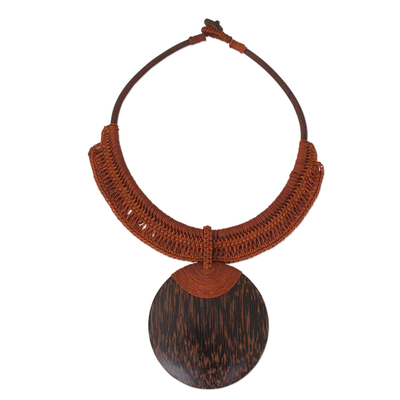 Leather and coconut wood pendant necklace, 'Ginger Tribal Glam' - Leather and Wood Statement Necklace
