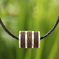 Wood pendant necklace, 'Forest Hero' - Wood Cord Pendant Necklace with Sterling Silver