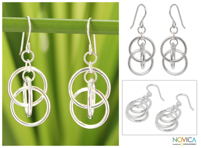 Sterling silver dangle earrings, 'Circle Game' - Modern Sterling Silver Dangle Earrings