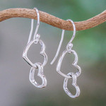 Sterling silver heart earrings, 'Locked in Love' - Women's Heart Shaped Sterling Silver Dangle Earrings