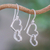 Sterling silver heart earrings, 'Locked in Love' - Women's Heart Shaped Sterling Silver Dangle Earrings thumbail