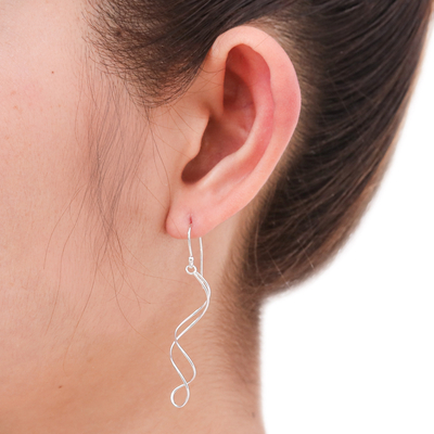 Sterling silver dangle earrings, 'Gentle Sigh' - Handcrafted Modern Sterling Silver Dangle Earrings