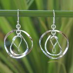 Sterling silver dangle earrings, 'Twirling' - Sterling Silver Dangle Earrings