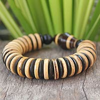 Coconut shell and wood stretch bracelet, 'Forest Moods' - Coconut shell and wood stretch bracelet