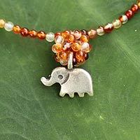 Carnelian pendant necklace, 'Elephantine Charm' - Hand Made Beaded Carnelian Necklace