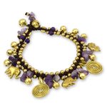 Amethyst charm bracelet, 'Splendor of Siam' - Hand Crafted Brass and Amethyst Elephant Charm Bracelet