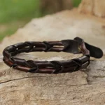 Men's leather wristband bracelet, 'World' - Men's Unique Braided Leather Bracelet