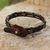 Men's leather wristband bracelet, 'World' - Men's Unique Braided Leather Bracelet