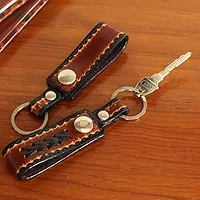 Leather key rings, 'Key to Success in Brown' (pair) - Hand Tooled Brown Leather Key Rings (Pair)