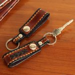 Leather key rings, 'Key to Success in Brown' (pair) - Hand Tooled Brown Leather Key Rings (Pair)
