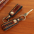 Leather key rings, 'Key to Success in Brown' (pair) - Hand Tooled Brown Leather Key Rings (Pair) thumbail