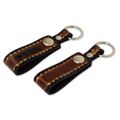 Leather key rings, 'Key to Success in Brown' (pair) - Hand Tooled Brown Leather Key Rings (Pair)
