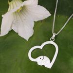 Sterling silver heart necklace, 'Heartfelt Elephant' - Thai Elephant Jewelry Necklace in Sterling Silver