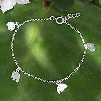 Sterling silver charm bracelet, 'Elephant Gang' - Handmade Sterling Silver Elephant Charm Bracelet