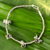 Silver charm bracelet, 'Hill Tribe Nosegays' - Silver charm bracelet