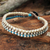 Braided wristband bracelet, 'Siam Melody' - Brown Beige and Blue Hand Made Bracelet Hill Tribe Jewelry