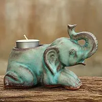 Ceramic tealight holder, 'Reclining Turquoise Elephant' - Celadon Ceramic Tea Light Holder from Thailand