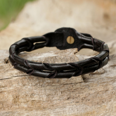 Men's leather wristband bracelet, 'Night World' - Handcrafted Black Braided Leather Bracelet for Men