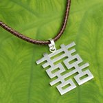 Men's sterling silver pendant necklace, 'Double Happiness' - Fair Trade Sterling Silver Necklace for Men Jewelry