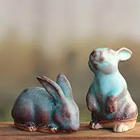 Figuras de cerámica, 'Joyful Rabbits' (par) - Figuras de conejos de cerámica hechas a mano en color turquesa (par)