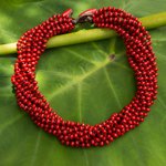 Wood torsade necklace, 'Bangkok Belle' - Red Torsade Necklace Wood Beaded Jewelry