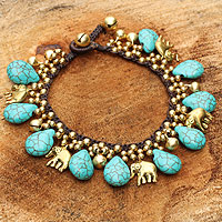 Brass charm bracelet, 'Siam Legacy' - Brass Beaded Turquoise coloured Elephant Bracelet