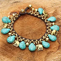 Brass charm bracelet, 'Siam Legacy' - Brass Beaded Turquoise Colored Elephant Bracelet