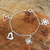 Sterling silver charm bracelet, 'Inspiring' - Handmade Sterling Silver Charm Bracelet thumbail