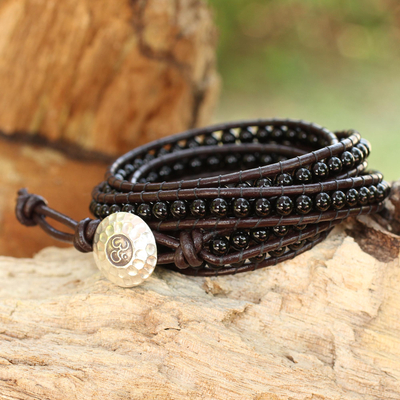 Onyx wrap bracelet, 'Black Sun' - Hand Knotted Onyx and Leather Wrap Bracelet from Thailand