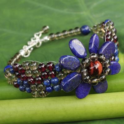 Lapis lazuli and garnet beaded bracelet, 'Floral Solitaire' - Beaded Smoky Quartz and Lapis Lazuli Flower Bracelet