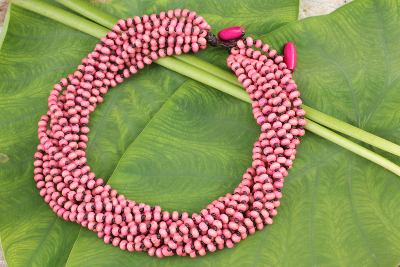 Wood torsade necklace, 'Kok Belle' - Pastel Pink Torsade Necklace Wood Beaded Jewelry