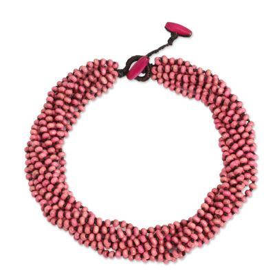 Wood torsade necklace, 'Kok Belle' - Pastel Pink Torsade Necklace Wood Beaded Jewelry