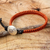 Leather and silver wristband bracelet, 'Orange Om' - Orange Macrame on Leather Bracelet with Silver Button