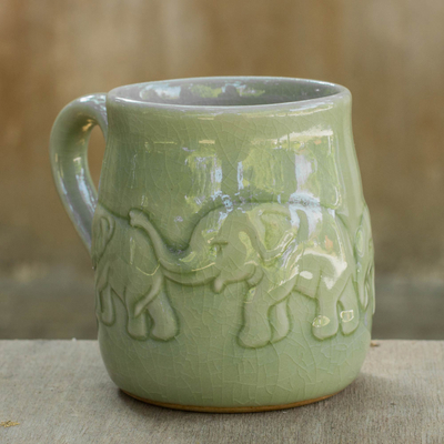 Celadon ceramic mug, 'Jade Elephant Parade' - Handcrafted Glazed Celadon Ceramic Mug (9 oz)