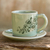 Celadon ceramic demitasse cup and saucer, 'Jade Blossoms' - Hand Painted Green Celadon Espresso Cup and Saucer
