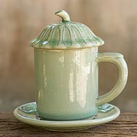 Celadon ceramic covered cup and saucer, 'Green Lotus Leaf'