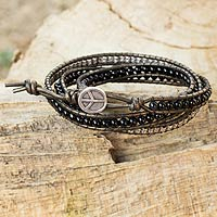 Leather and onyx wrap bracelet, 'Peace' - Leather Onyx Beaded Fine Silver Wrap from Thailand