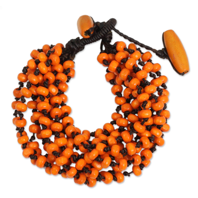 Wood beaded bracelet, 'Lamphan Belle' - Orange Torsade Bracelet Wood Beaded Jewelry