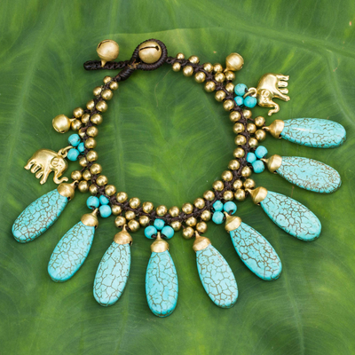 Brass charm bracelet, 'Siam Legacy II' - Brass Beaded Turquoise coloured Elephant Bracelet