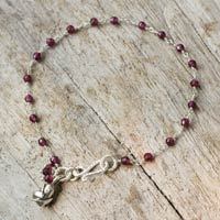 Garnet flower bracelet, 'Red Rose Horizon' - Handcrafted Sterling Silver and Garnet Bracelet